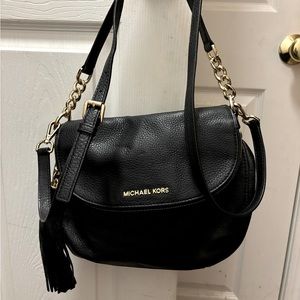 Black leather Michael Kors pocketbook with the long strap and the short strap